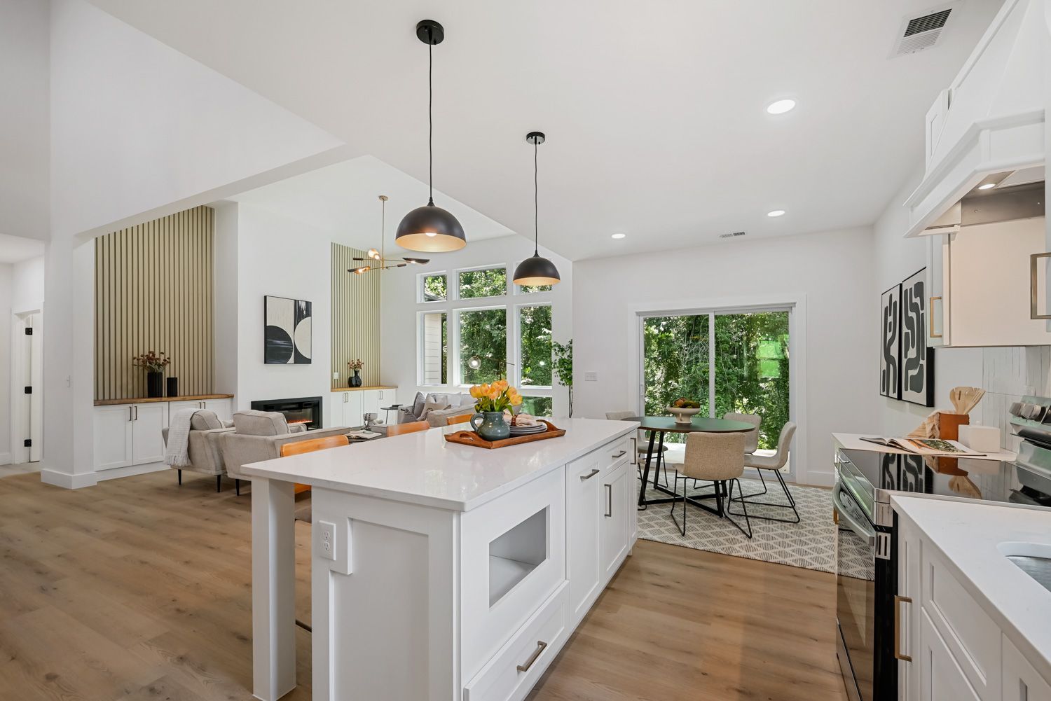 Kitchen with a large island in the center of an Atlanta home, captured by Craig Westerman and the Hometrack Real Estate Marketing team, professional photographers near you in Atlanta, Georgia.