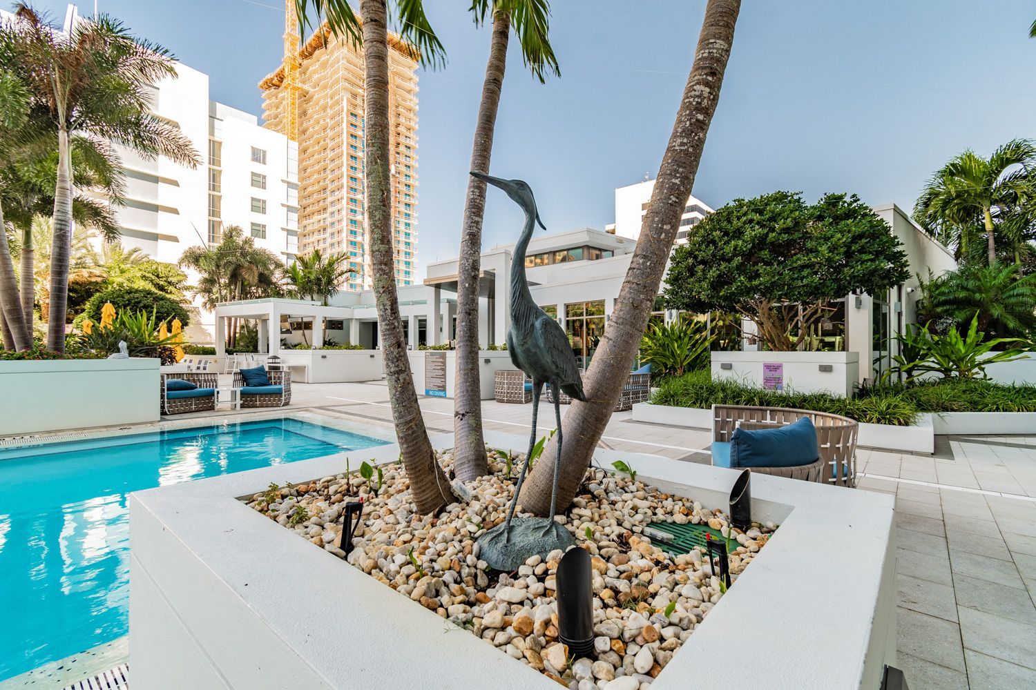 Professional photographers near you 
shoot - Backyard courtyard of a hotel in St. Petersburg, Florida, located next to a sparkling swimming pool.