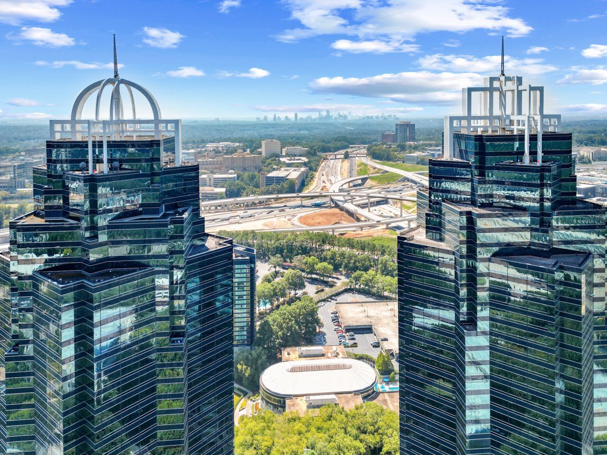 An drone shoot of Atlanta between 2 skyscrapers in Downtown city photo shoot by Craig Westerman and Hometrack team.