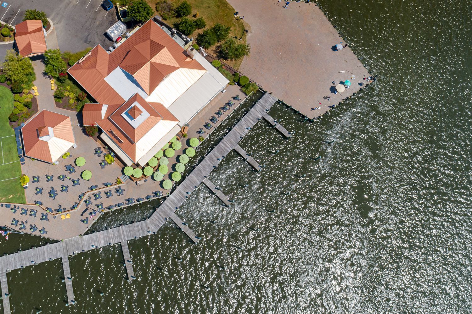 Drone shoot capturing a building next to a tranquil body of water on Kent Island, Maryland, by passionate real estate photographers near you.