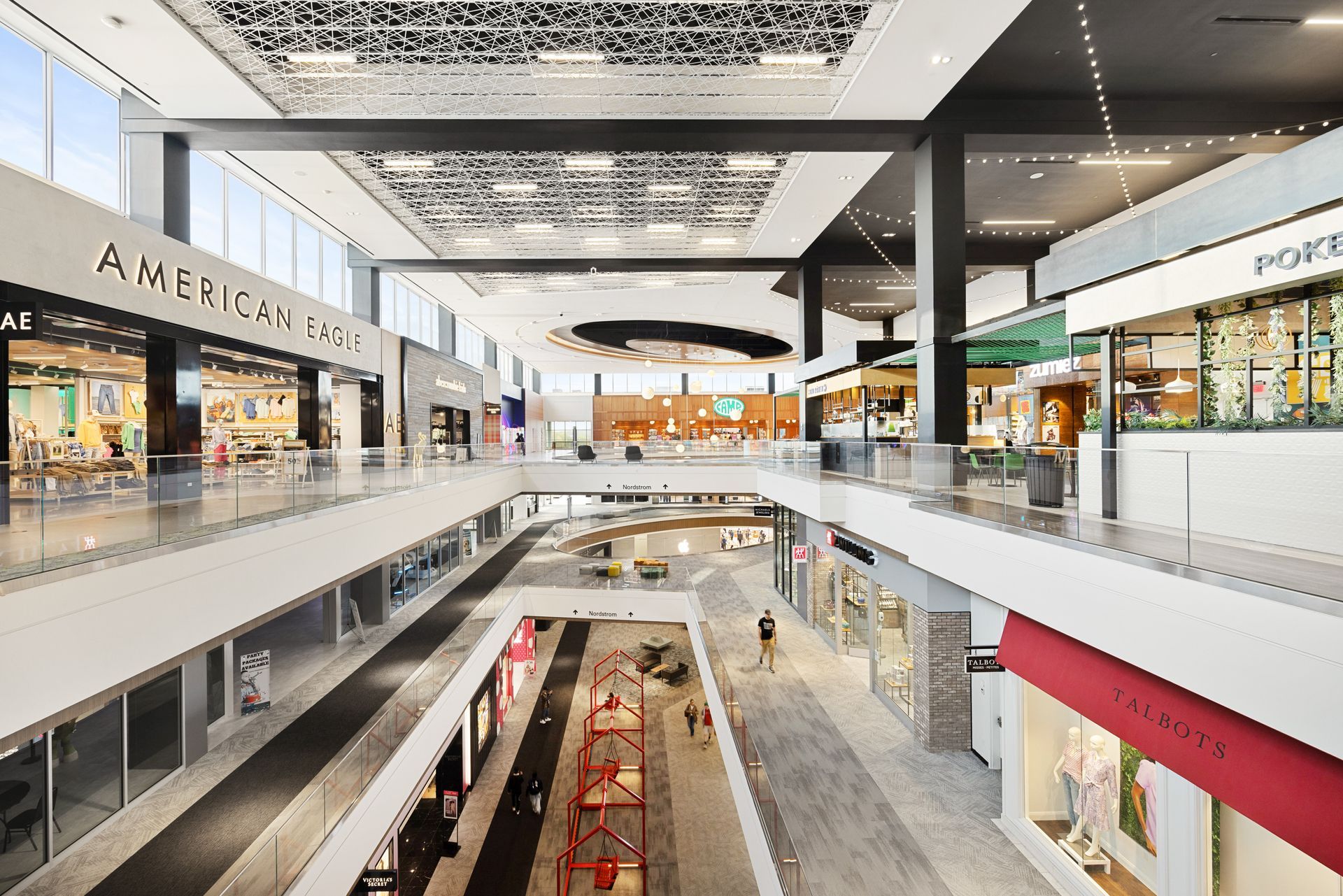 An artist 's impression of the inside of a shopping mall.