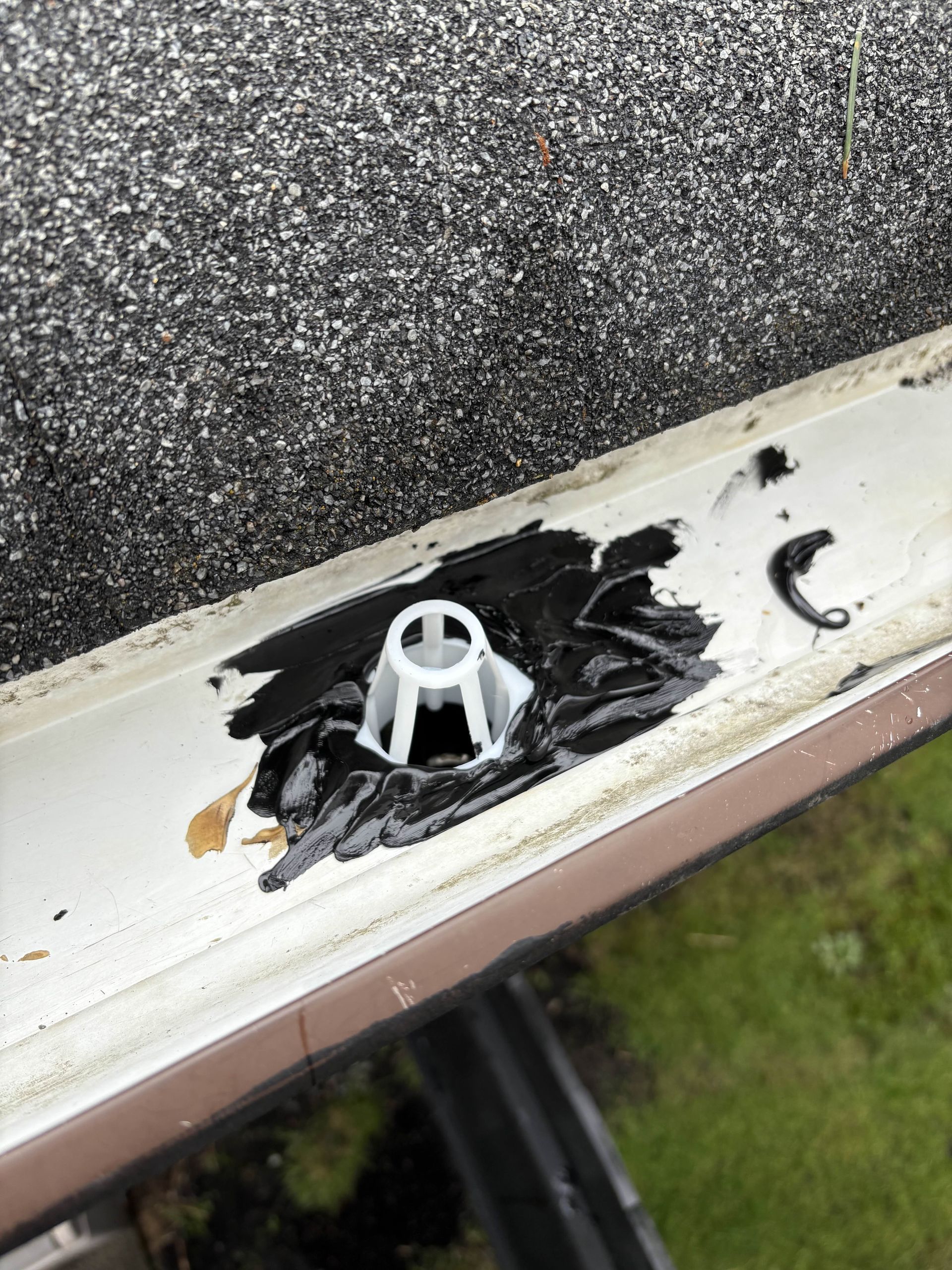 Ensure you gutters work like new this season Gutter downspout being installed inside the gutter