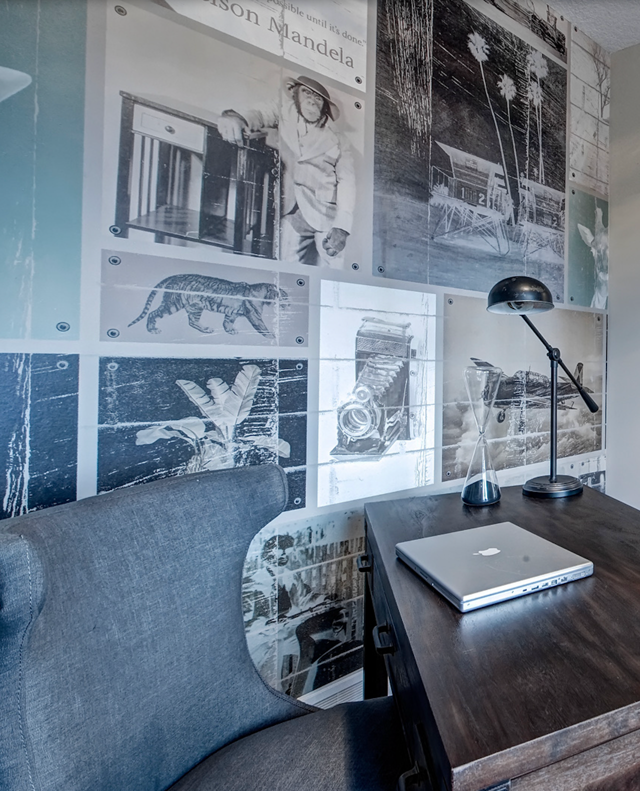 A chair sits in front of a desk with a laptop on it