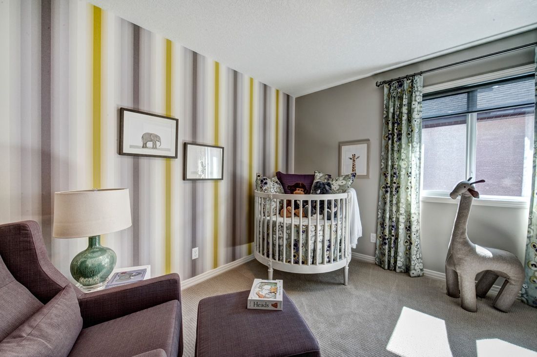 There is a crib in the middle of the room.