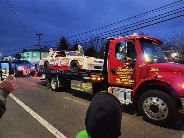 Nashville Wrecker Service — Two man Standing besides Baileys Truck in Nashville, TN