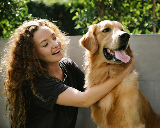 happy dog with owner