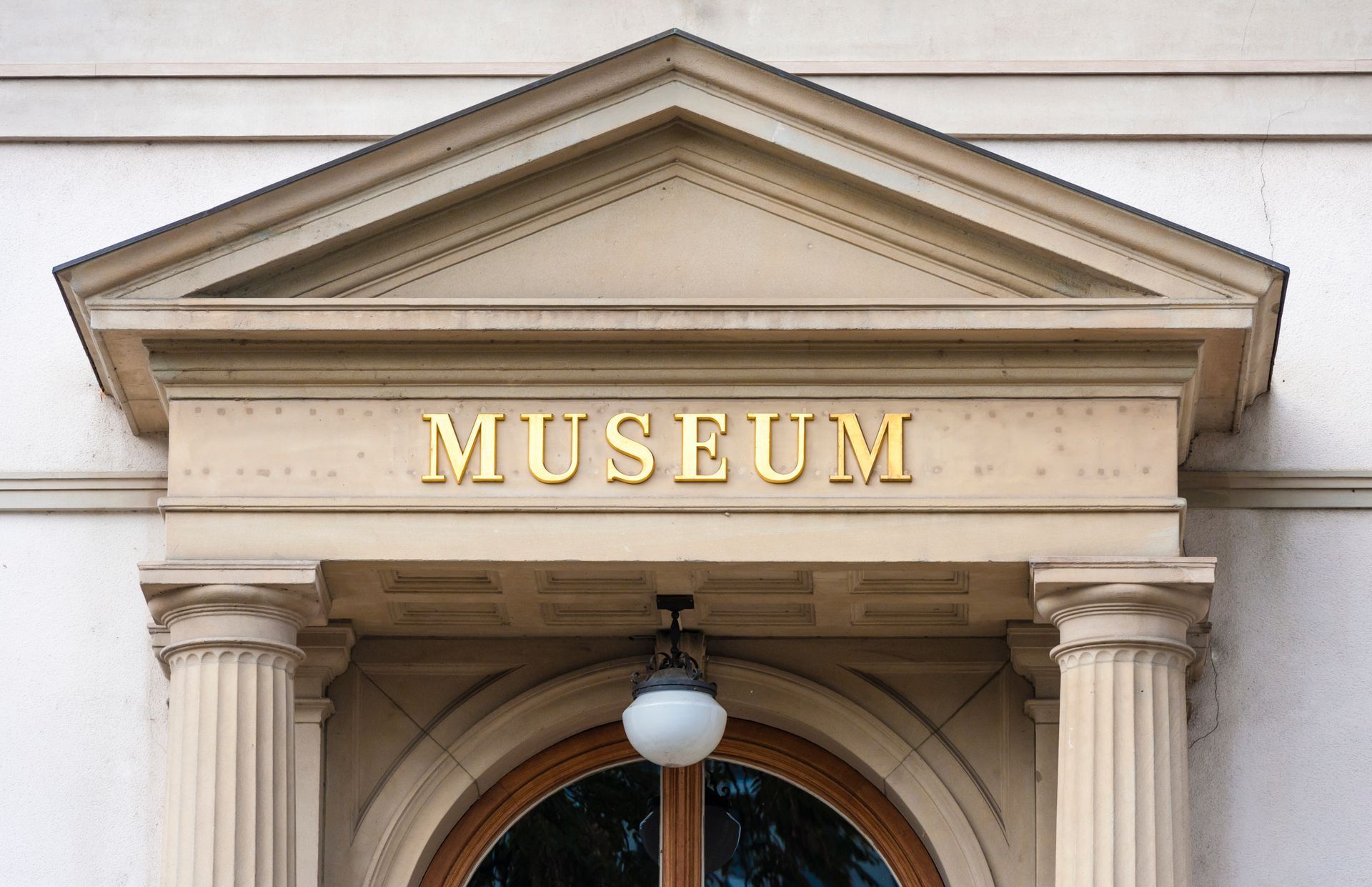 The word museum is on the top of a building