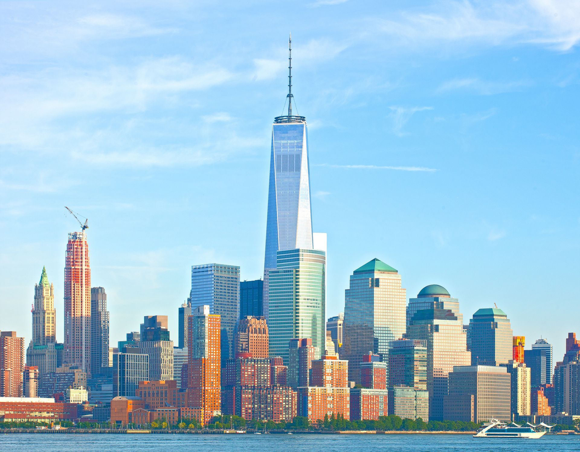 A view of the new york city skyline from the water
