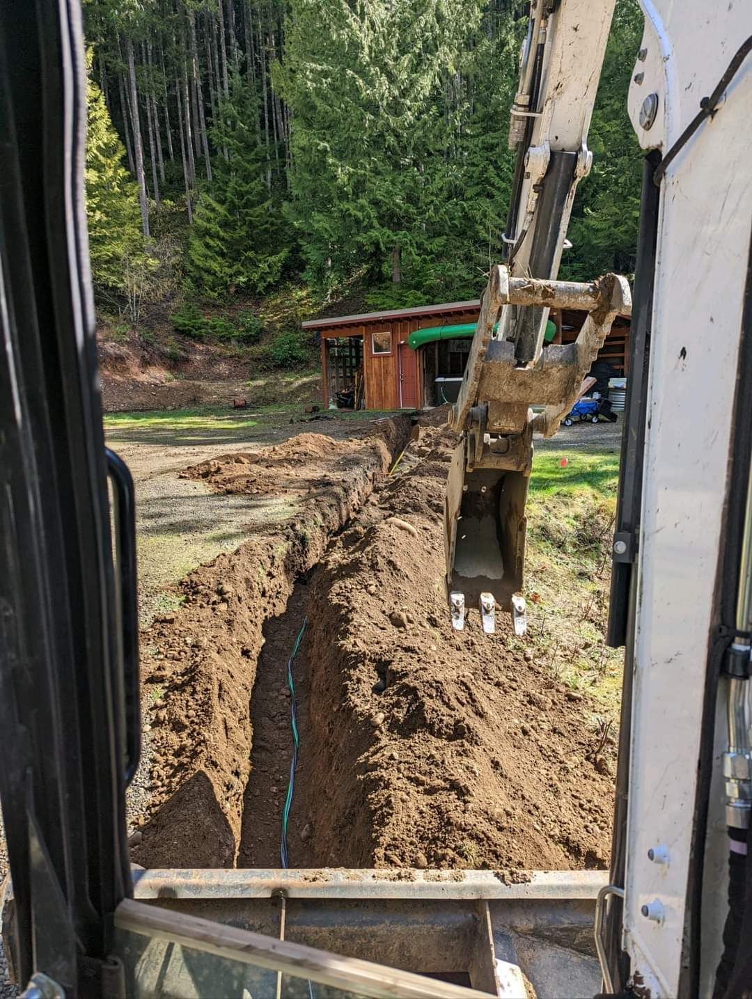 A bulldozer is digging a hole in the ground.