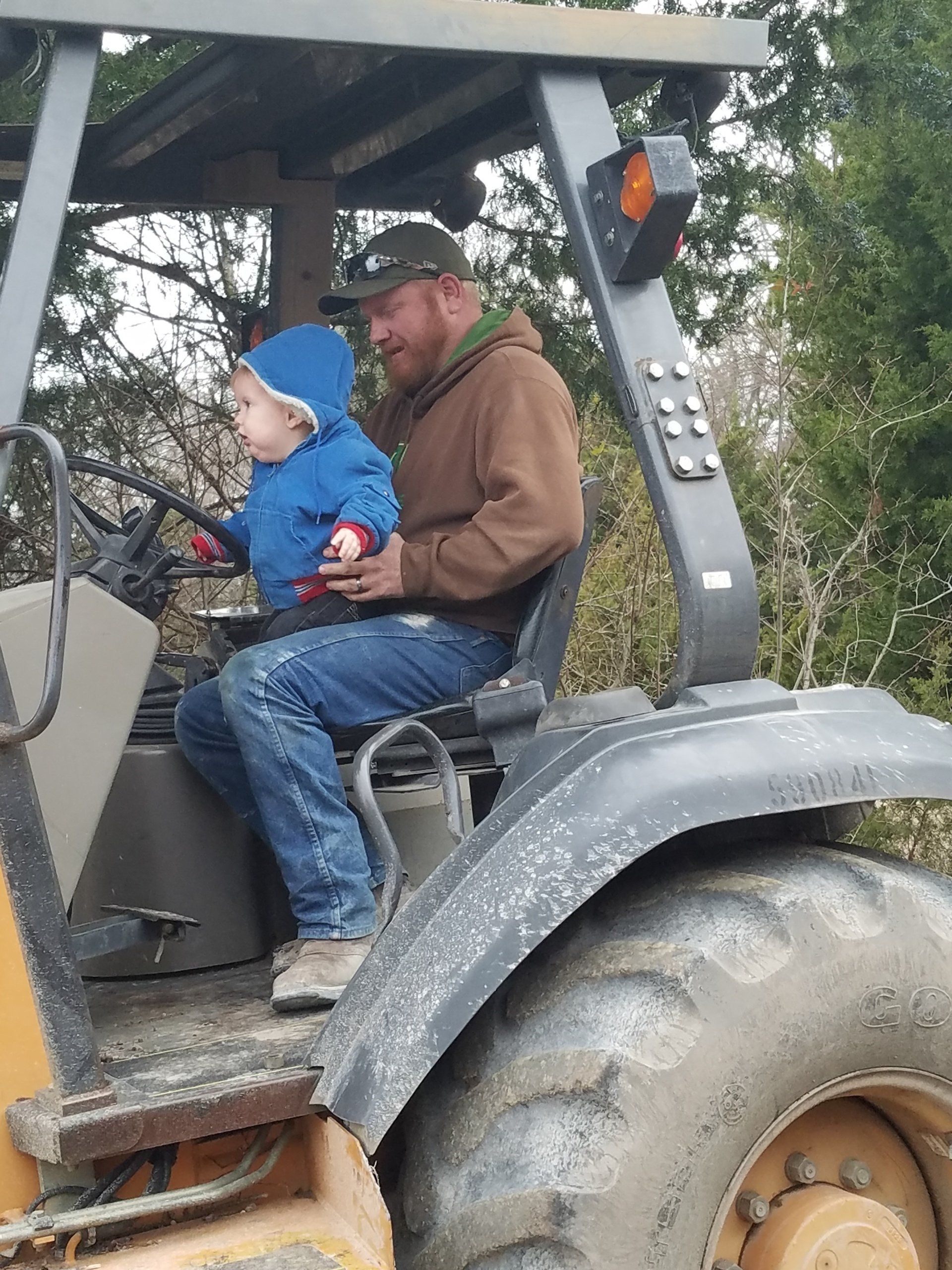 Father and Son in the Excavator Truck - Dallas, TX - All Around Septic Service Co