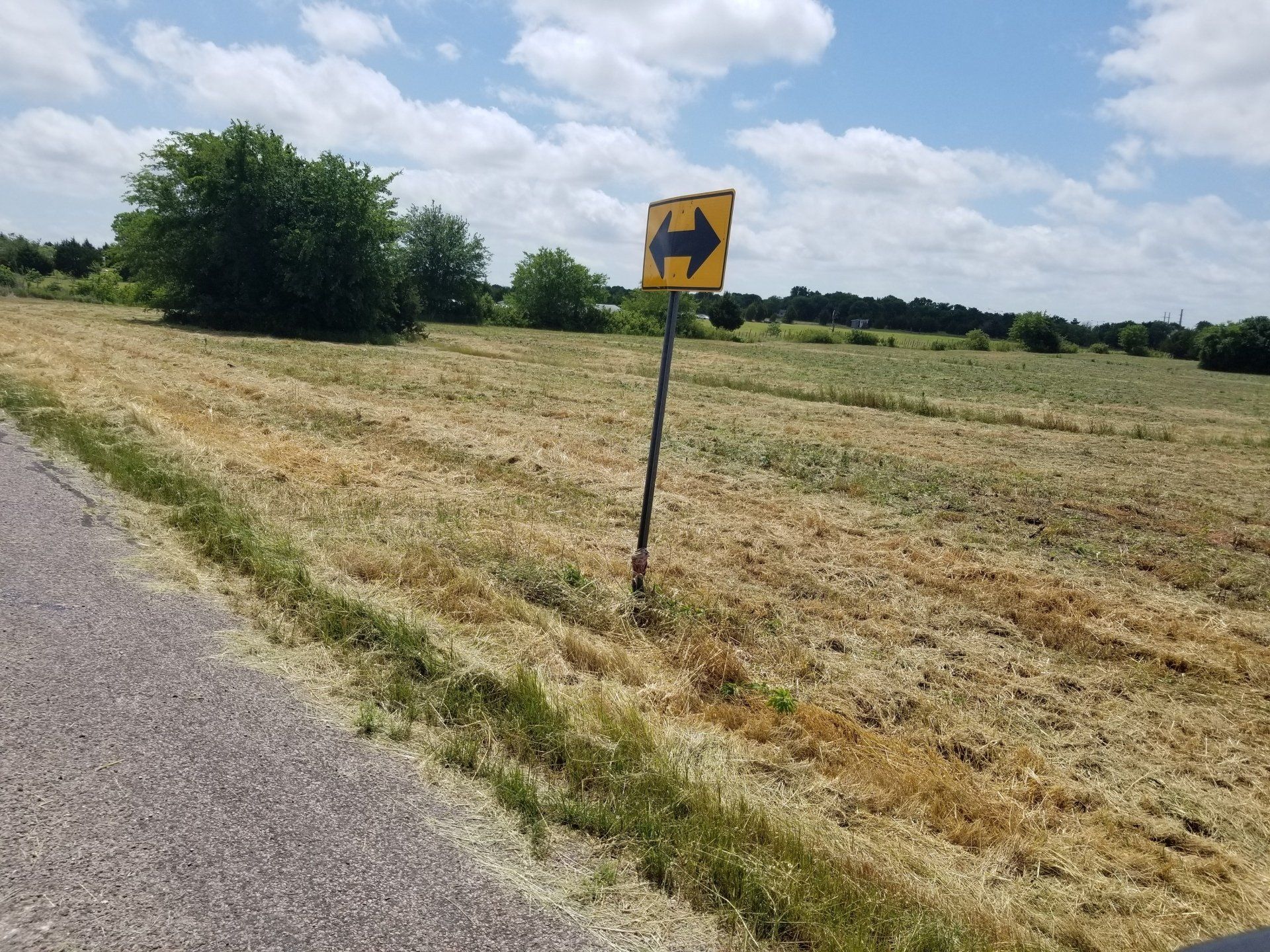 Wide Field with a Sign - Dallas, TX - All Around Septic Service Co