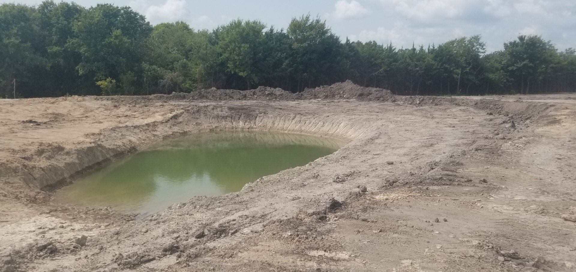 Clear Field with Lake - Dallas, TX - All Around Septic Service Co