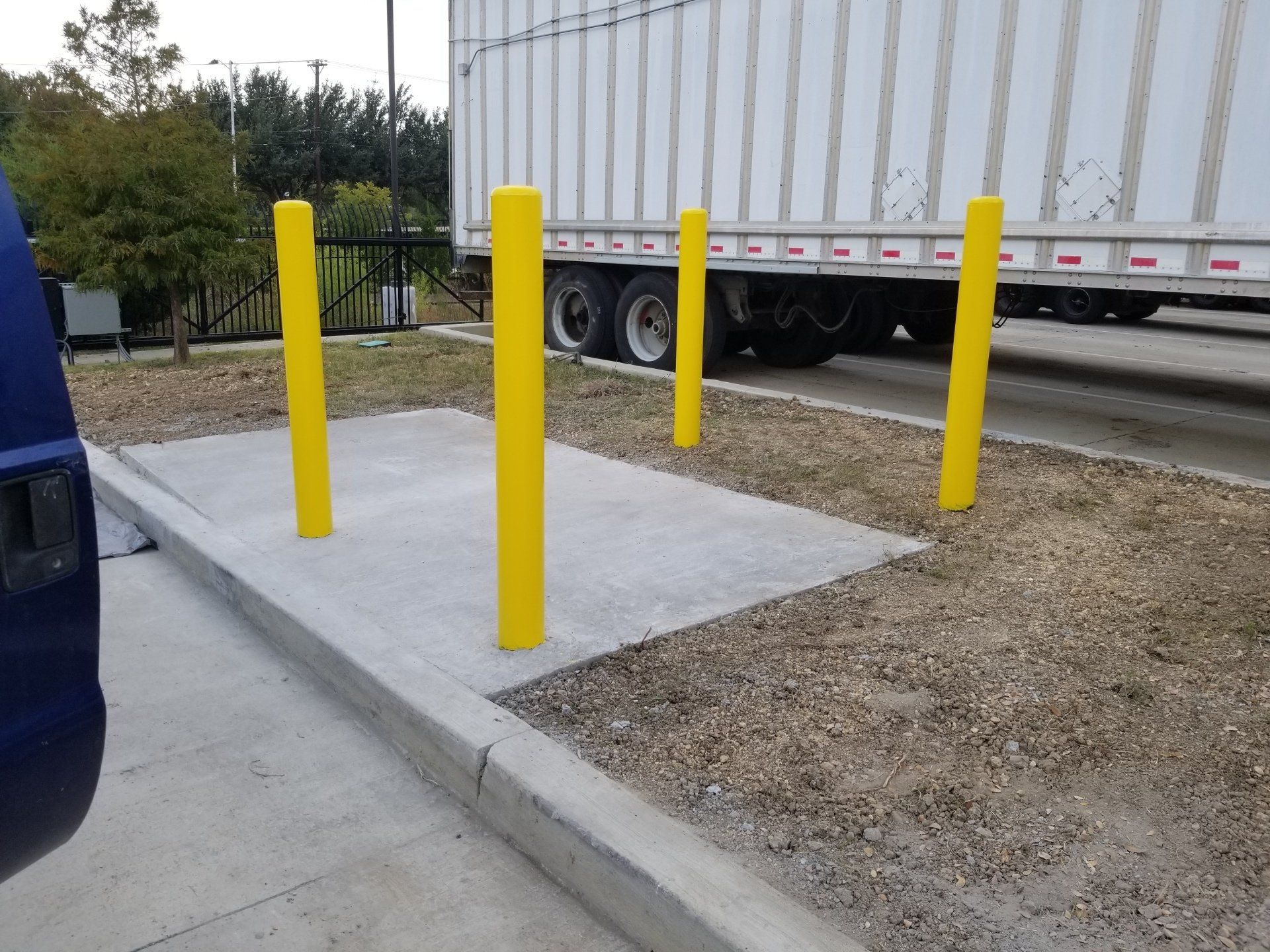 Cemented Platform with Yellow Polls - Dallas, TX - All Around Septic Service Co