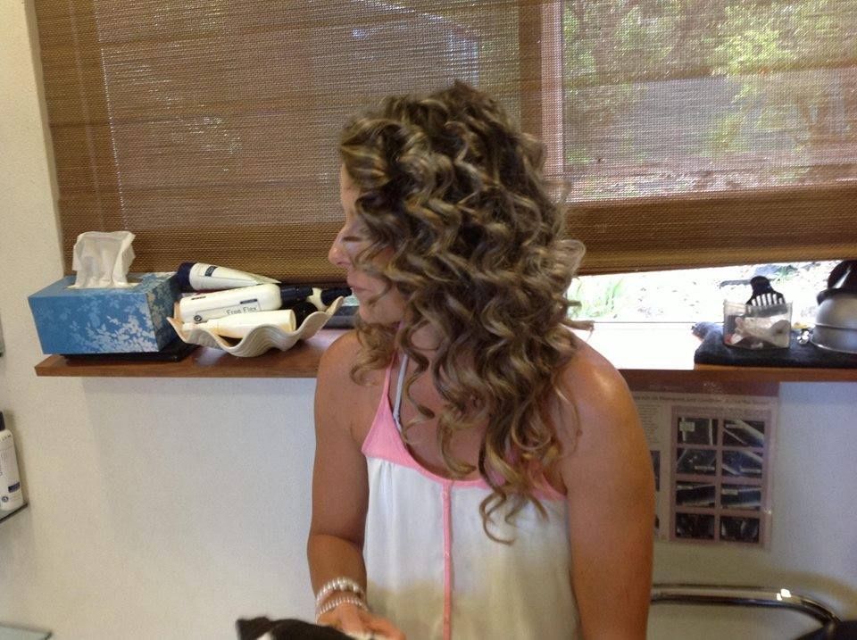 A Woman Is Wearing Pink And Blue Curlers In Her Hair — Spiroll Heated Rollers in Redlynch, QLD