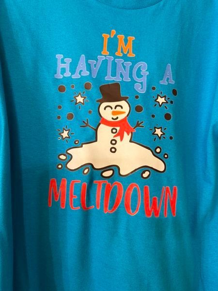 A blue shirt that says i 'm having a meltdown