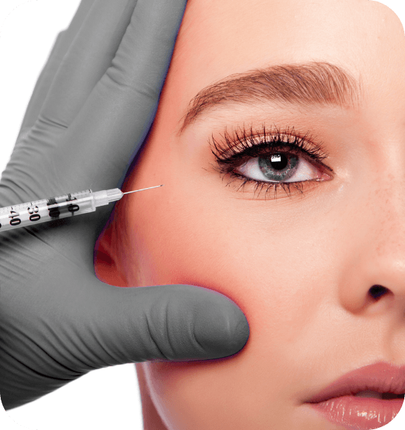 A woman is getting a botox injection in her face
