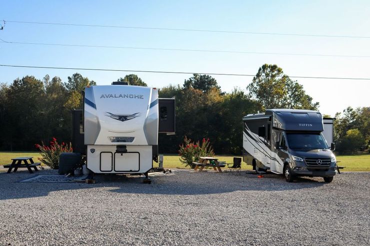 two rv's parked next to each other
