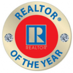 A realtor of the year badge with diamonds