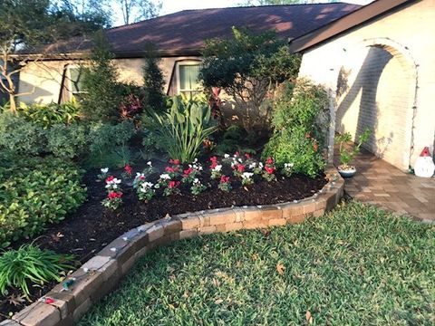 A house with a garden in front of it