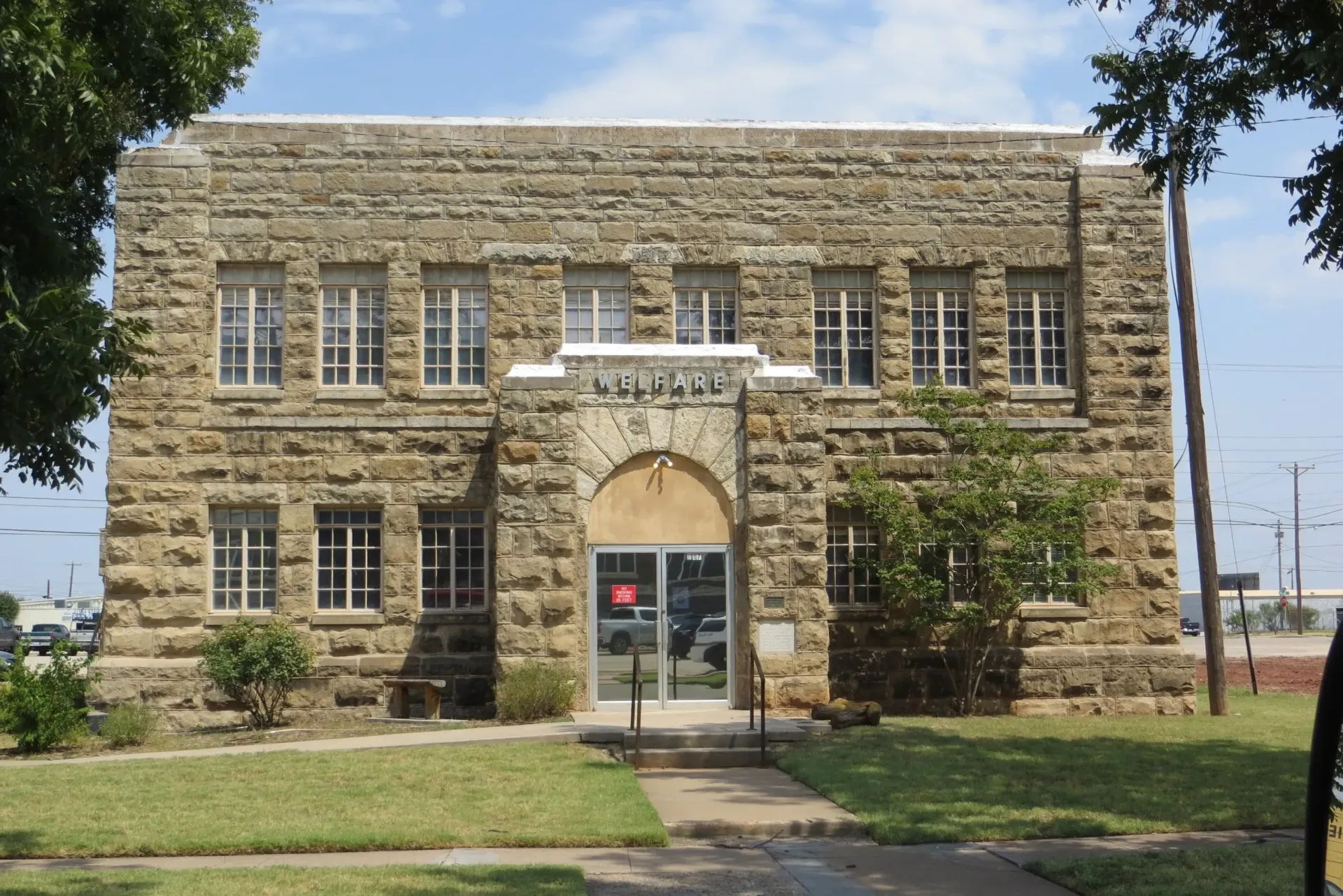 Historic 1884 Jail House limestone building in downtown Abilene, Texas showing original frontier-era architecture