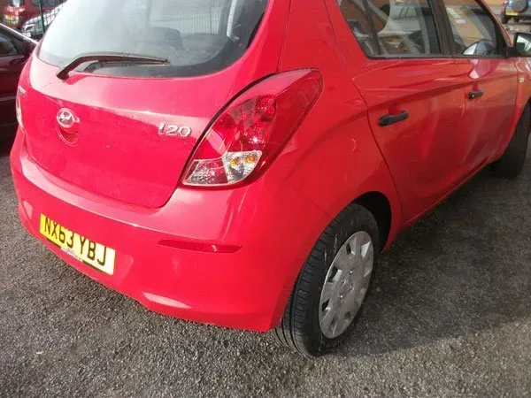 red car bumper repair