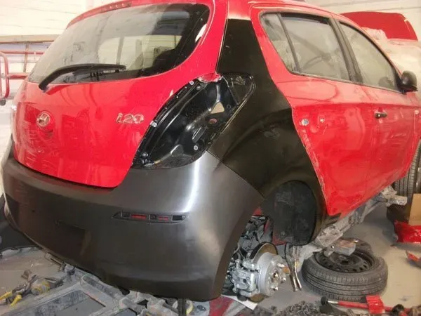 red car bumper repair