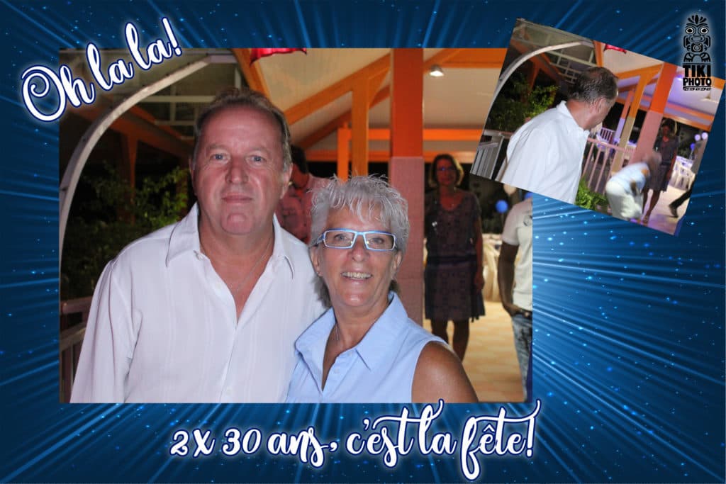 A man and woman are posing for a picture with the words oh la la la