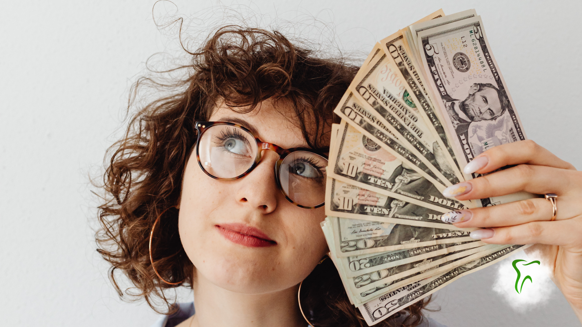 Canadian currency scattered. Includes $50 and $100 bills.