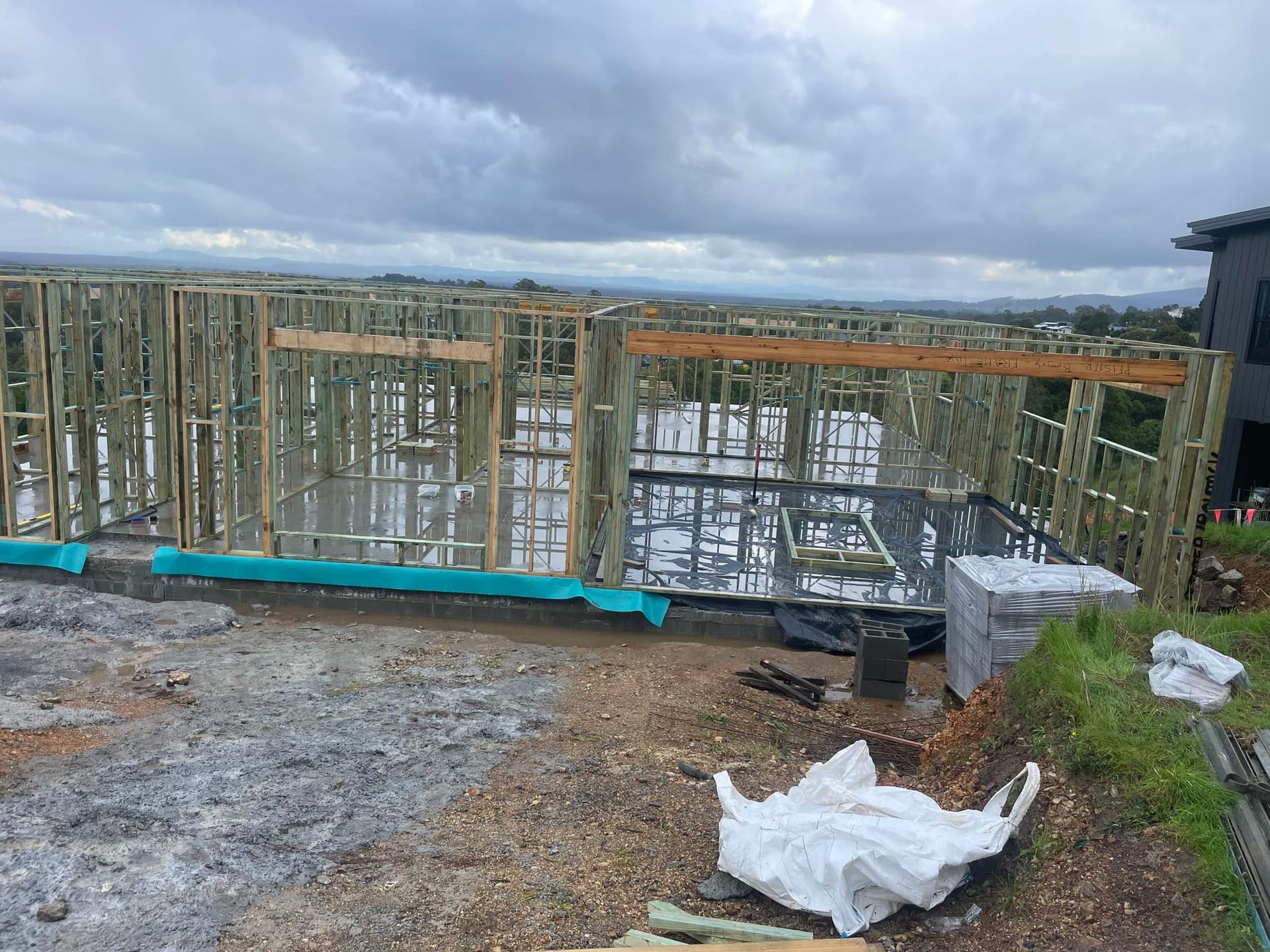 Construction Site With Wooden Frame Structure — McNamara's Frames & Trusses In Newcastle, NSW
