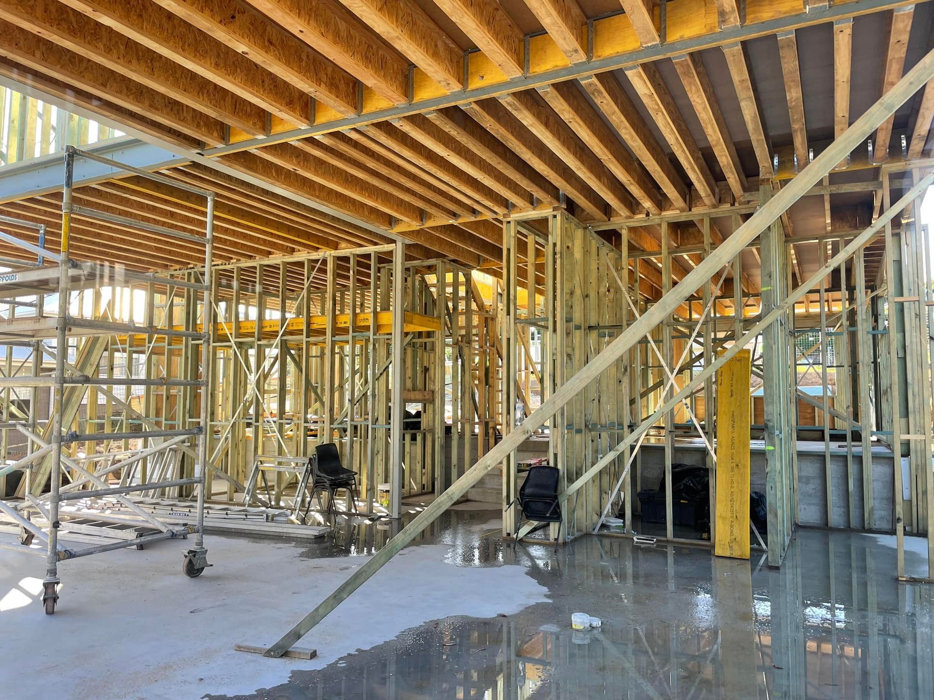 Wooden Framework of a Building Under Construction — McNamara's Frames & Trusses In Taree, NSW