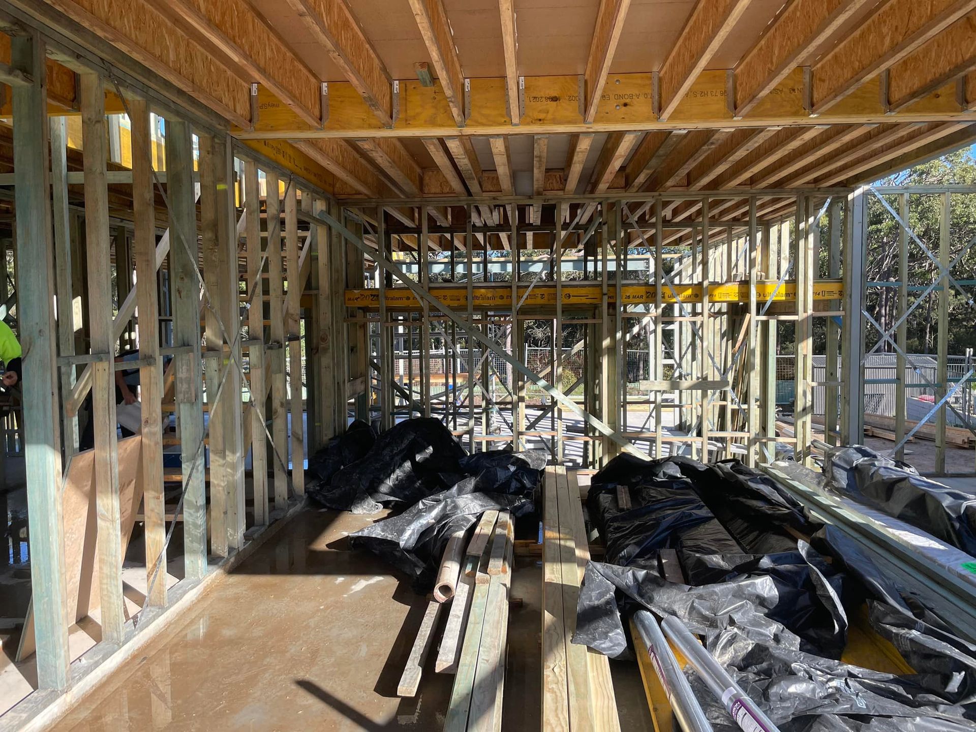 Wooden Frame of a Building Under Construction — McNamara's Frames & Trusses In Taree, NSW