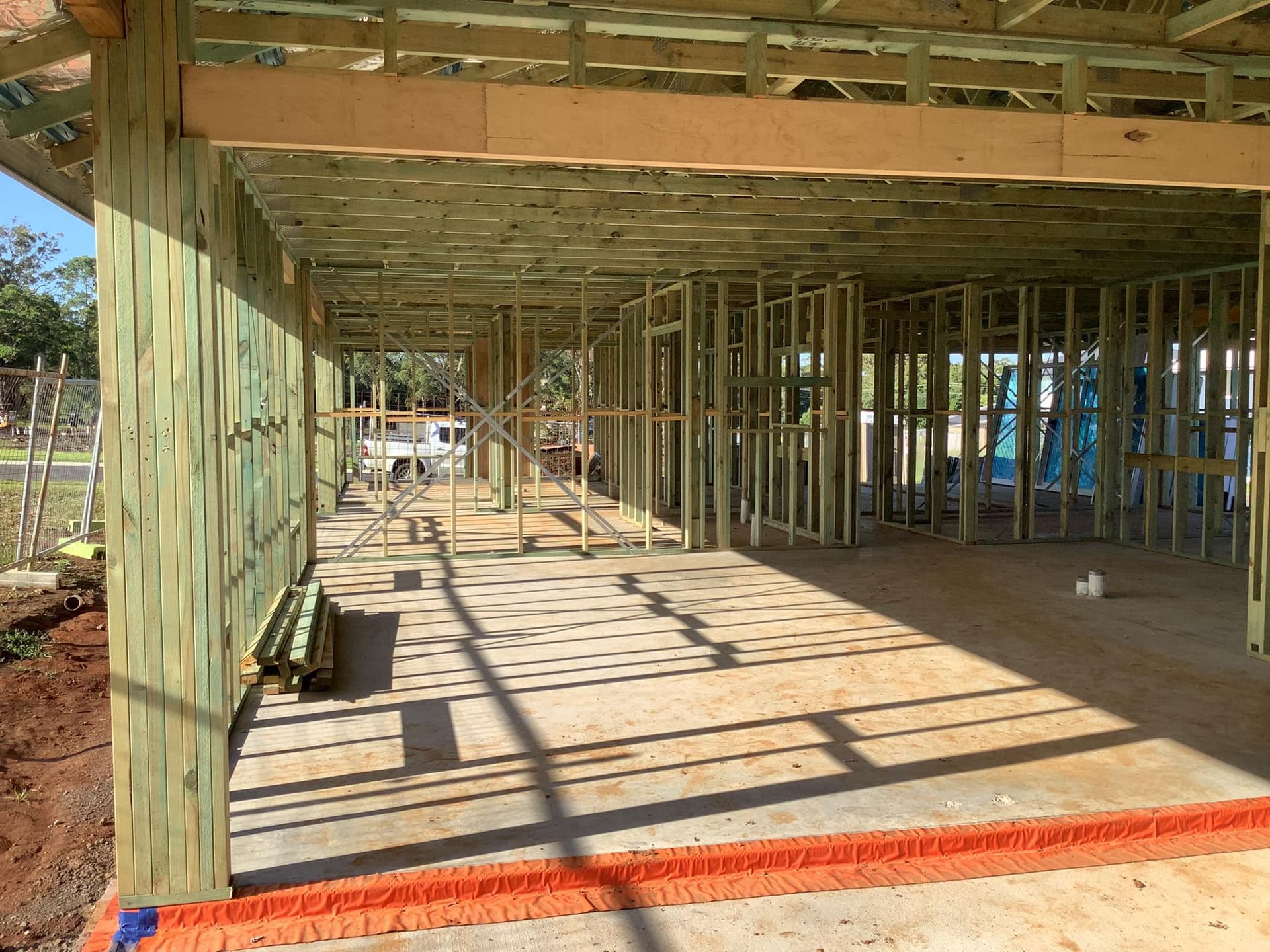 Wooden Frame of a Building Under Construction — McNamara's Frames & Trusses In Port Stephens, NSW