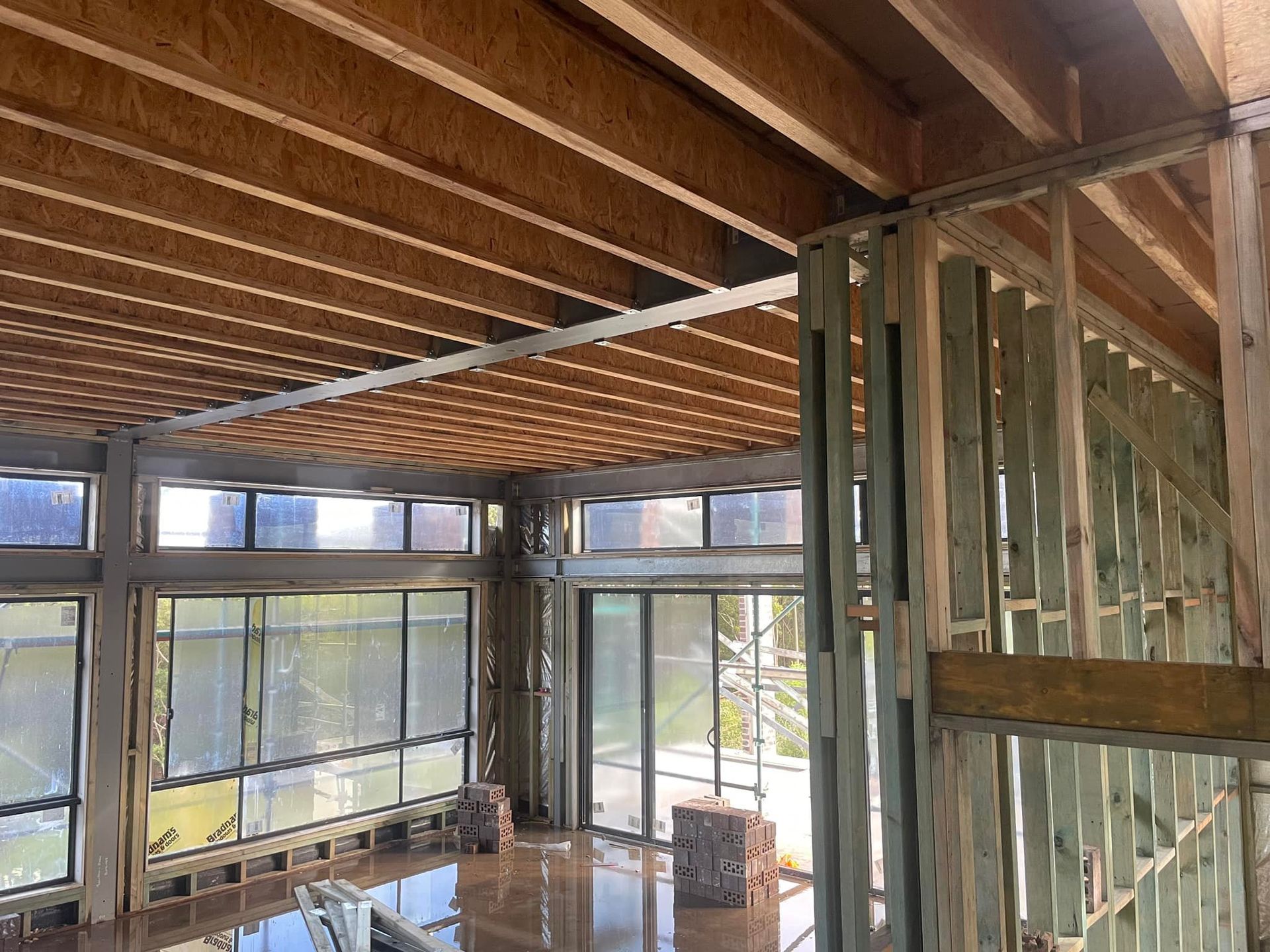 Construction Site: Wooden Framing of a Building — McNamara's Frames & Trusses In Forster, NSW