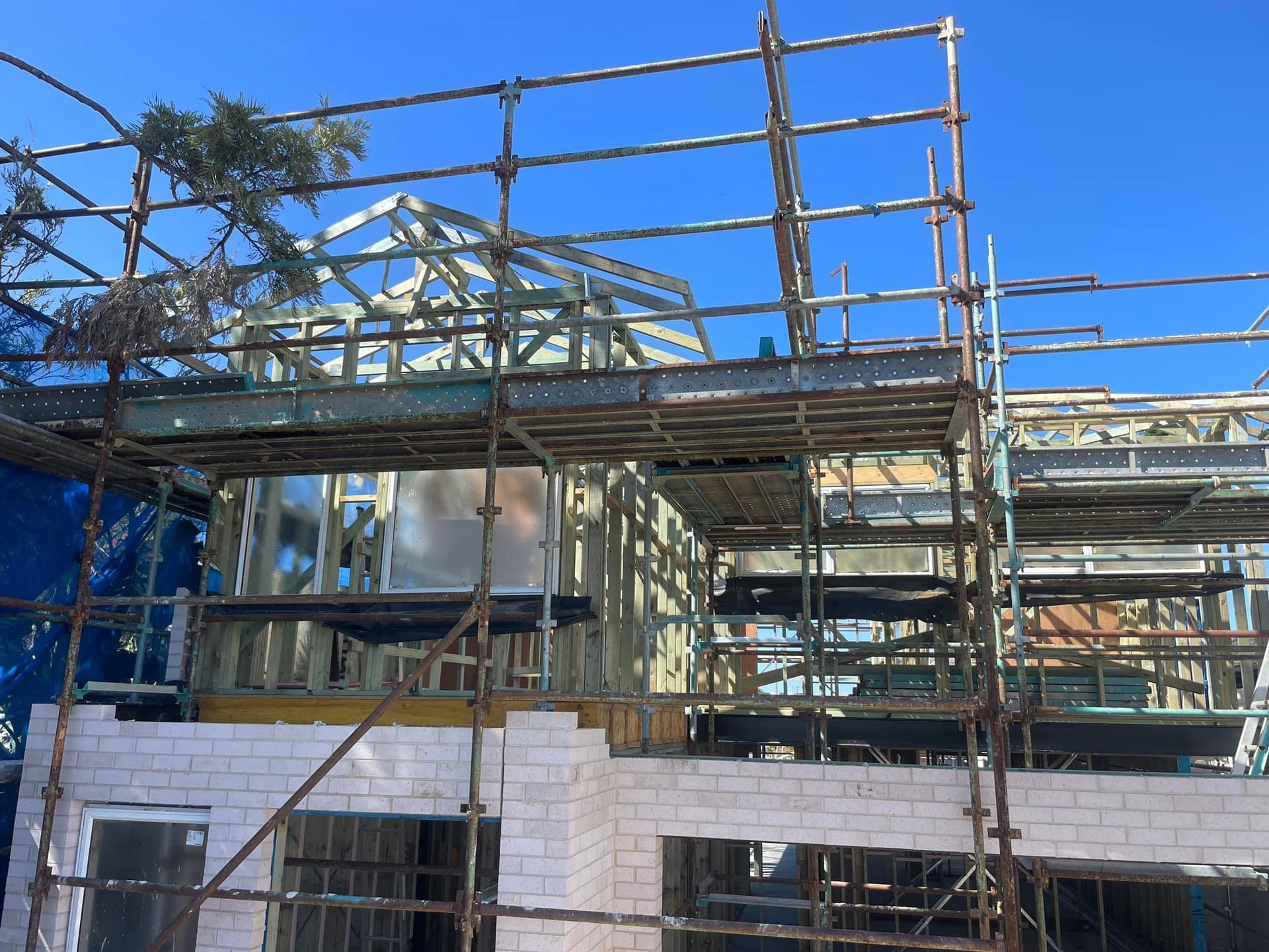 Construction Site Wood-framed House Under Construction — McNamara's Frames & Trusses In Gosford, NSW
