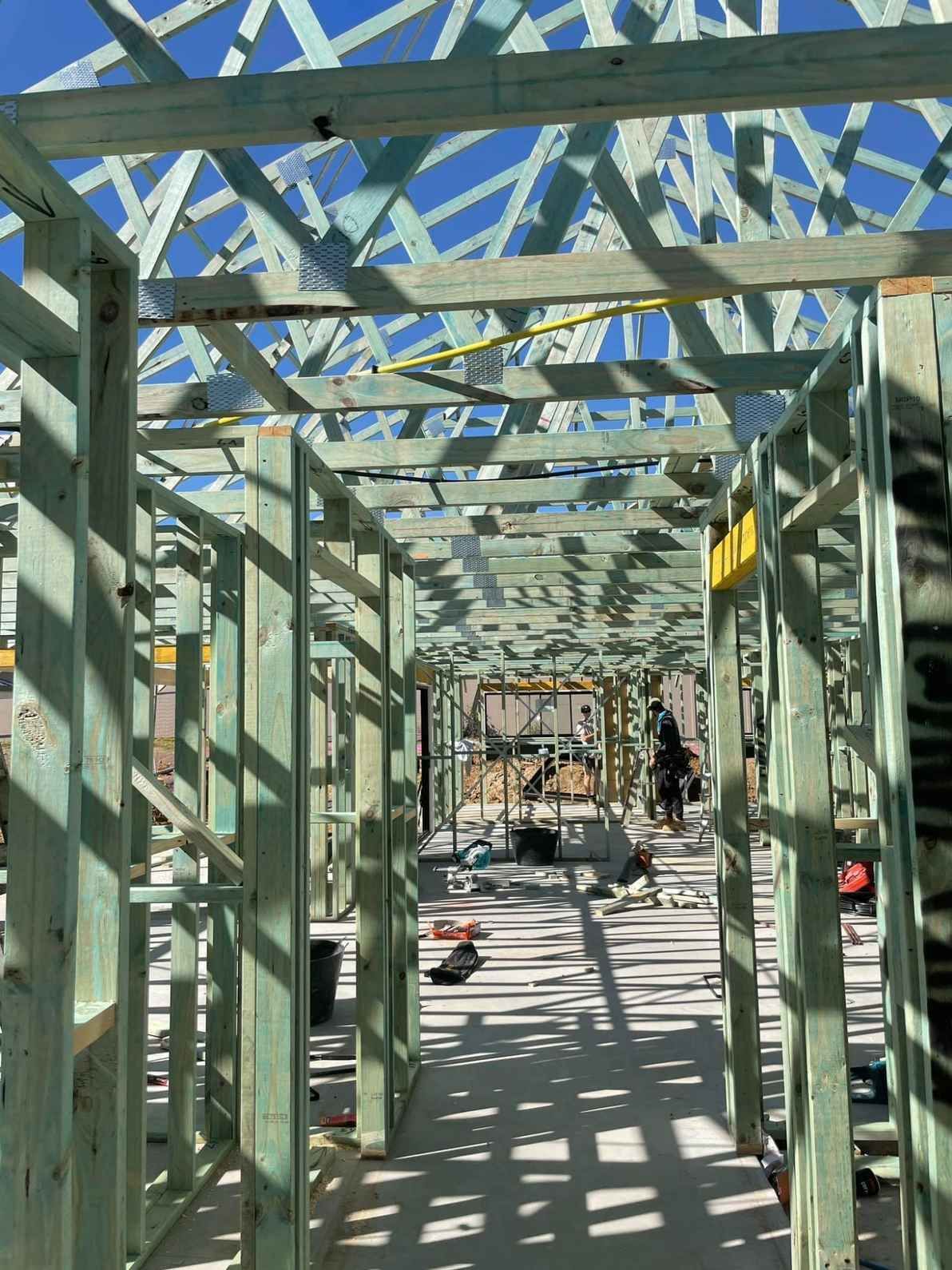 Wooden Framework of a Building Under Construction — McNamara's Frames & Trusses In Terrigal, NSW