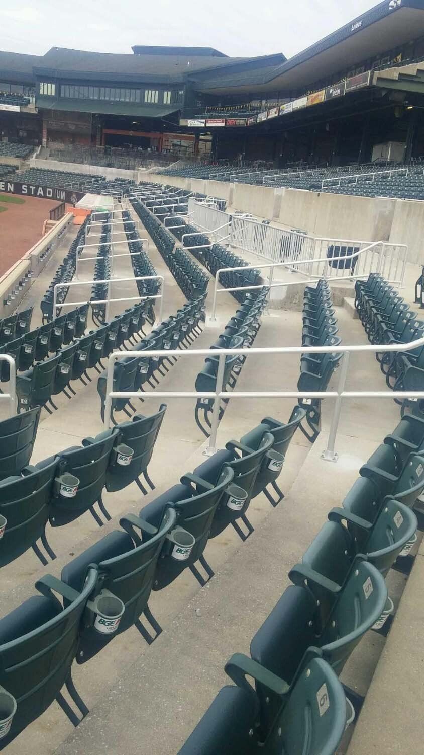 Empty green stadium seats.