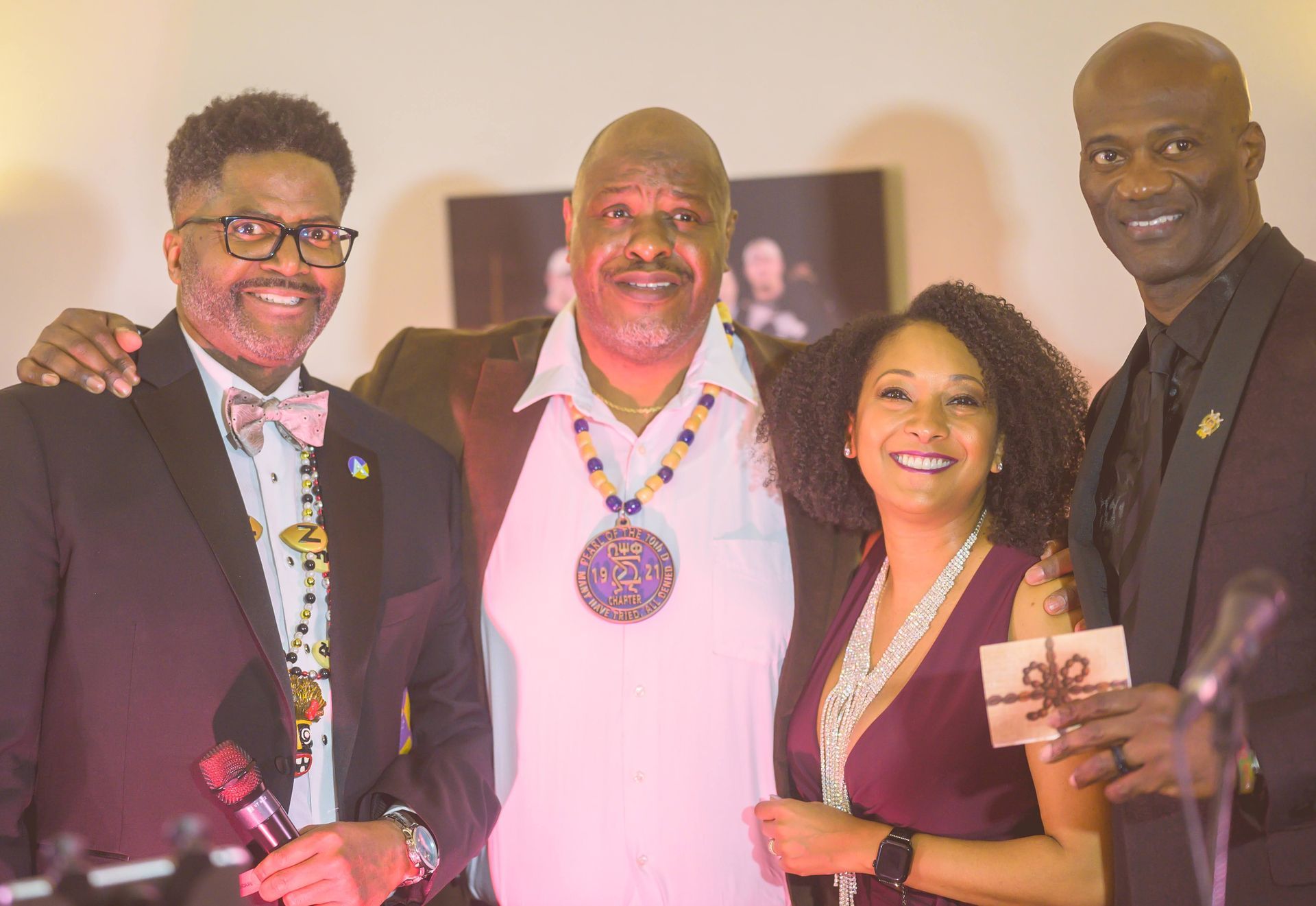 A group of people are posing for a picture together.