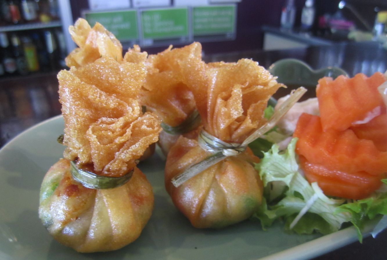 a plate of Thai food