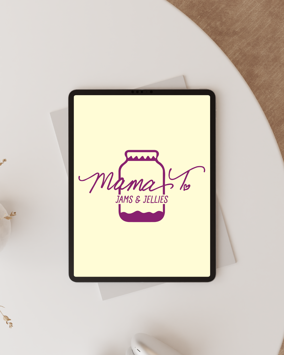 A computer monitor displays the logo for embrace in life care homes