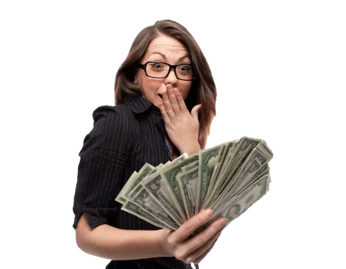 A woman covering her mouth while holding a fan of money