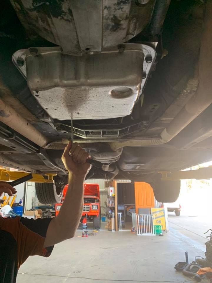 A Close Up of a Stainless Steel Exhaust Pipe on a Car — Gricey's Workshop Automotive Specialist in West Wodonga, VIC