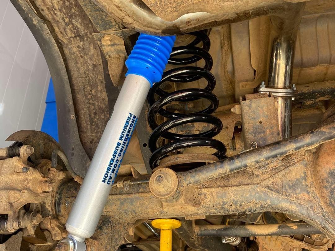 A Close Up of a Shock Absorber on a Vehicle — Gricey's Workshop Automotive Specialist in West Wodonga, VIC