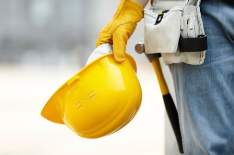 Holding Safety Helmet — San Fransisco, CA — The Law Offices of Jeffrey M. Greenberg