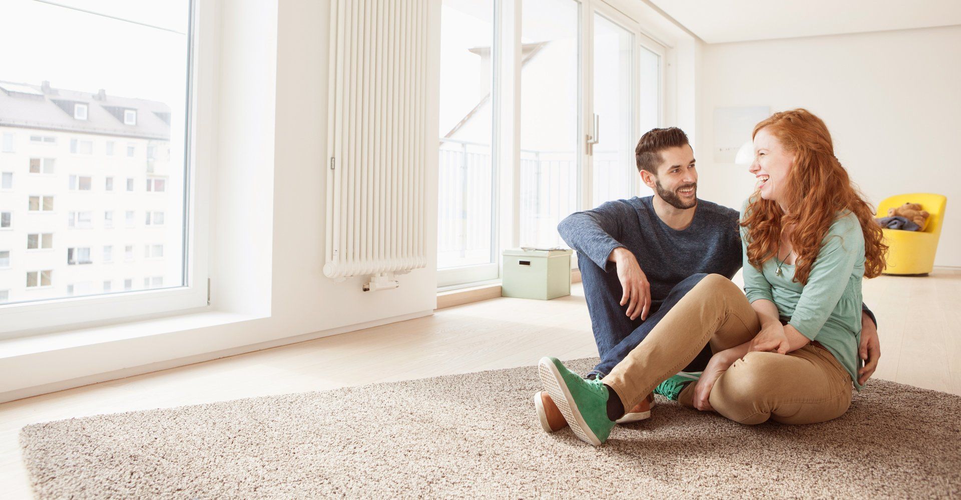 couple sitting on the carpet