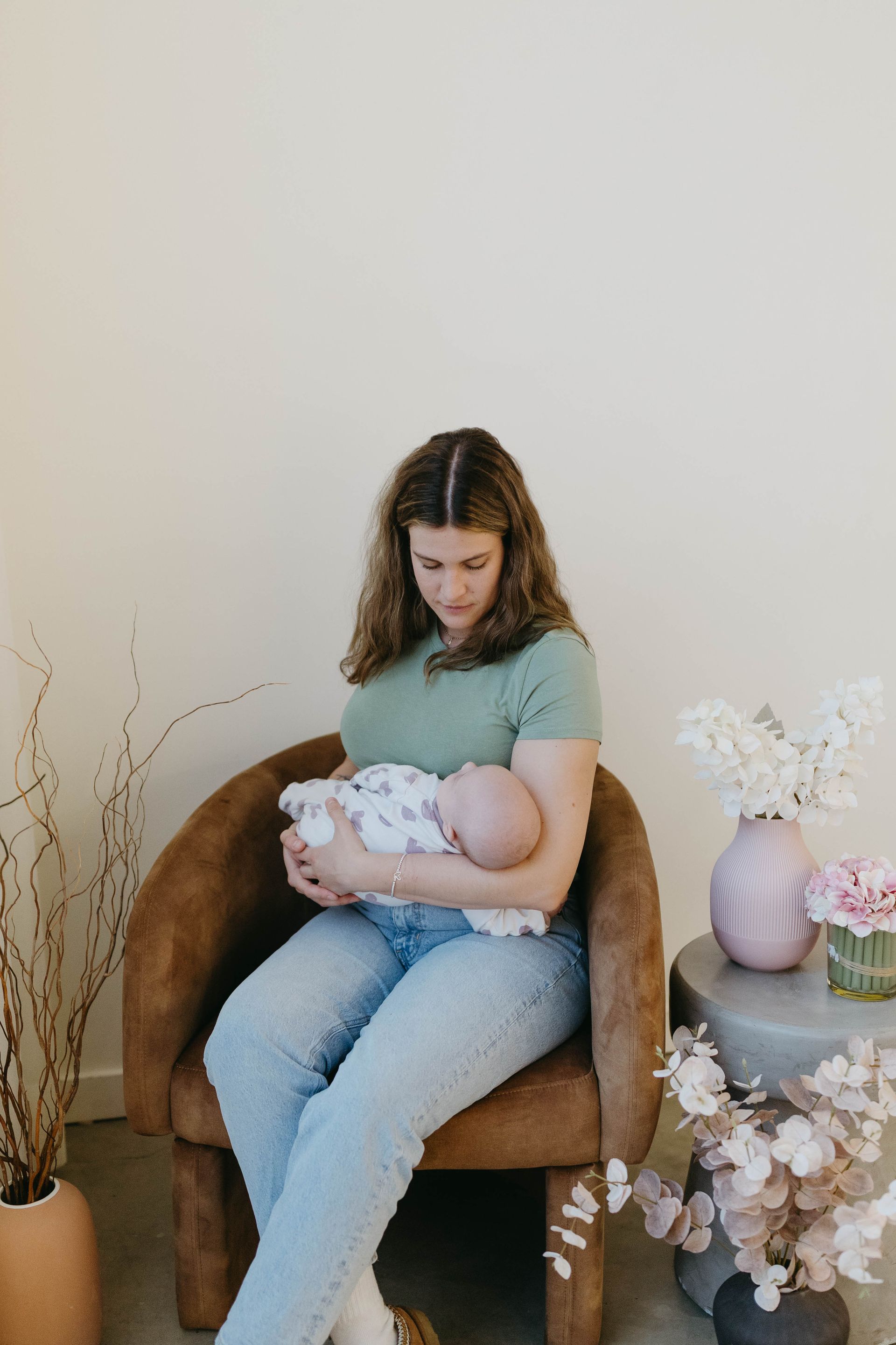 jayme coaching a client about postpartum care