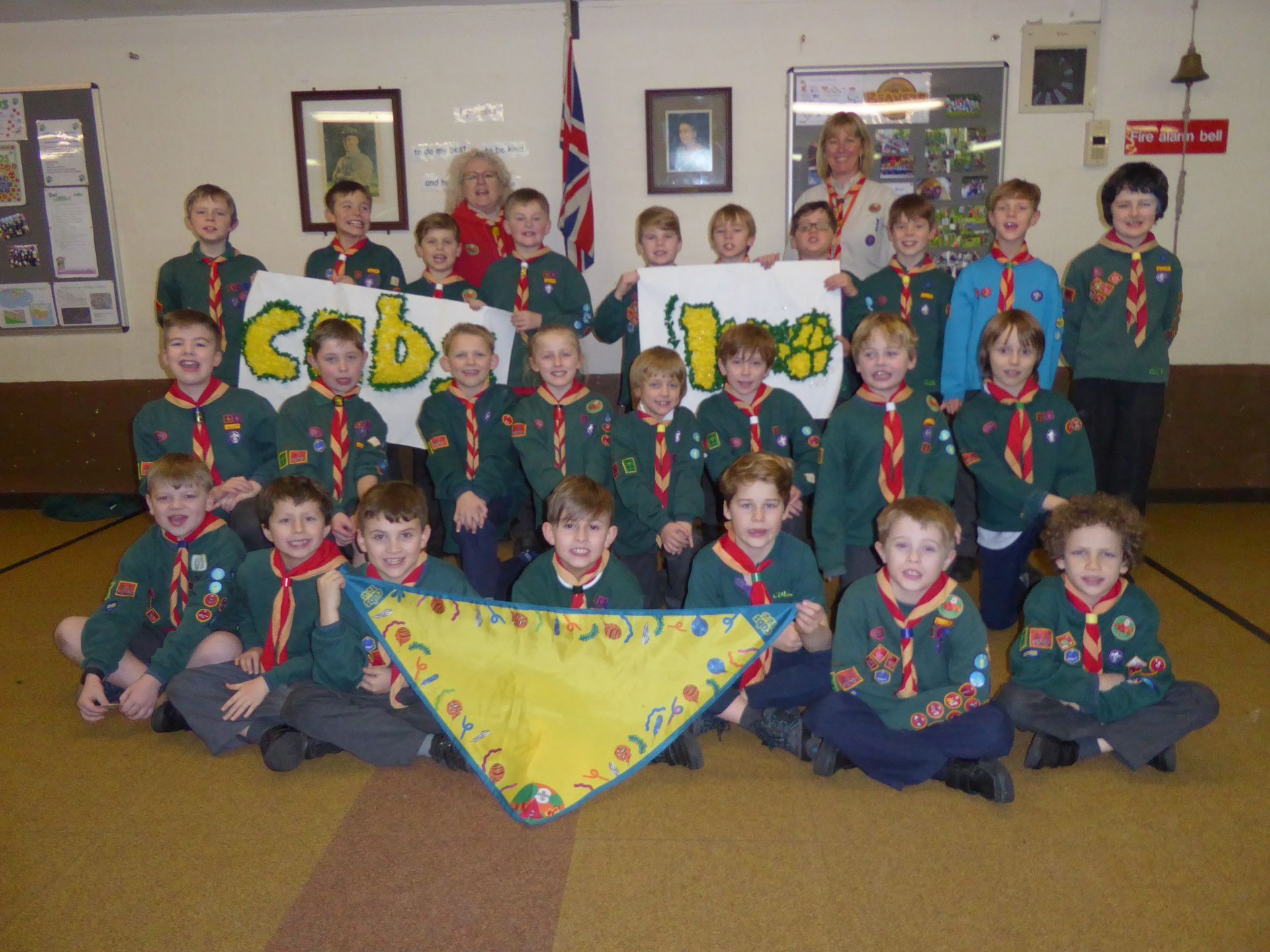 A group of cub scouts pose for a picture