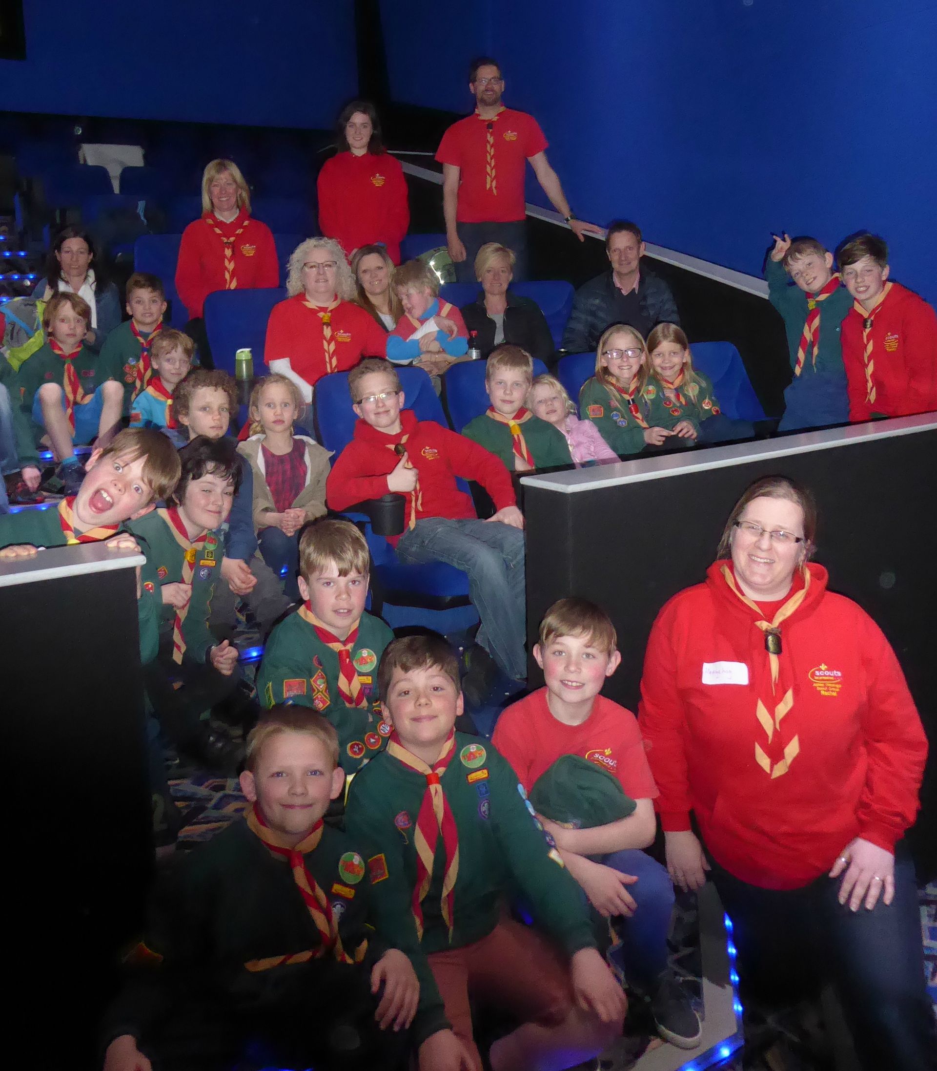 A group of children are posing for a picture in a room