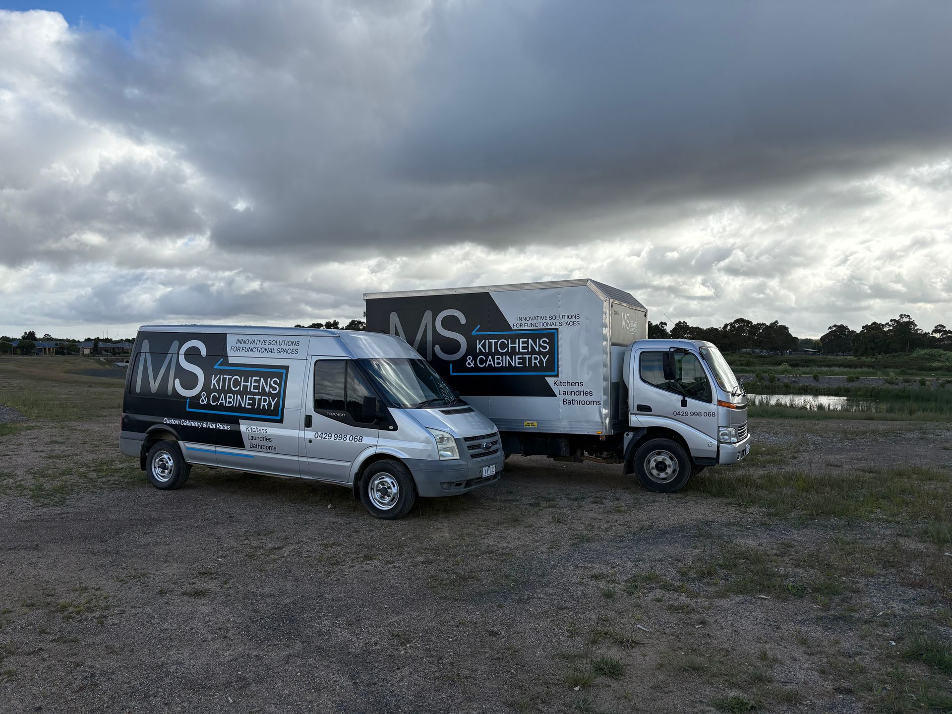 Two silver vehicles with 