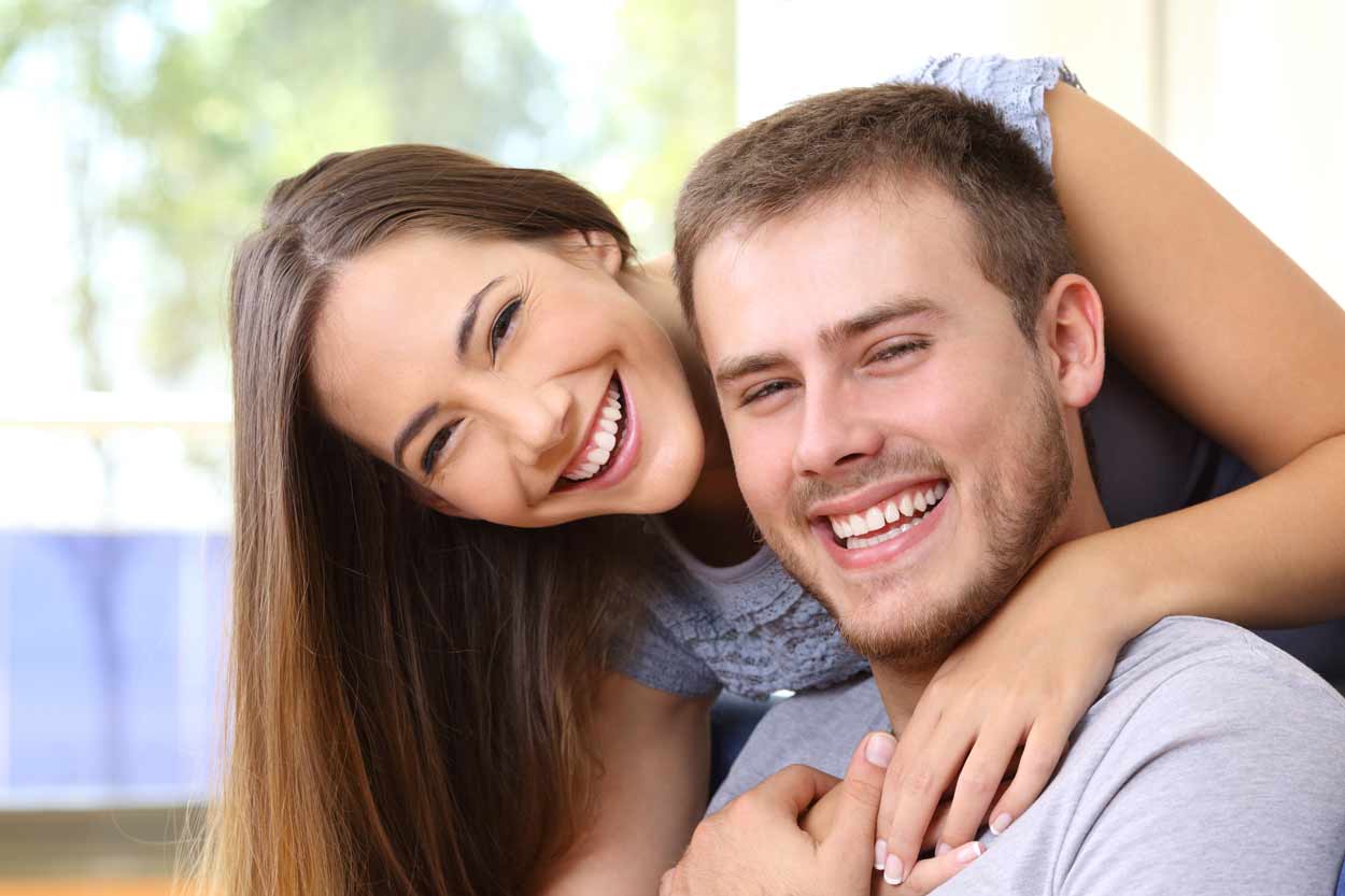 Happy smiling couple with great teeth
