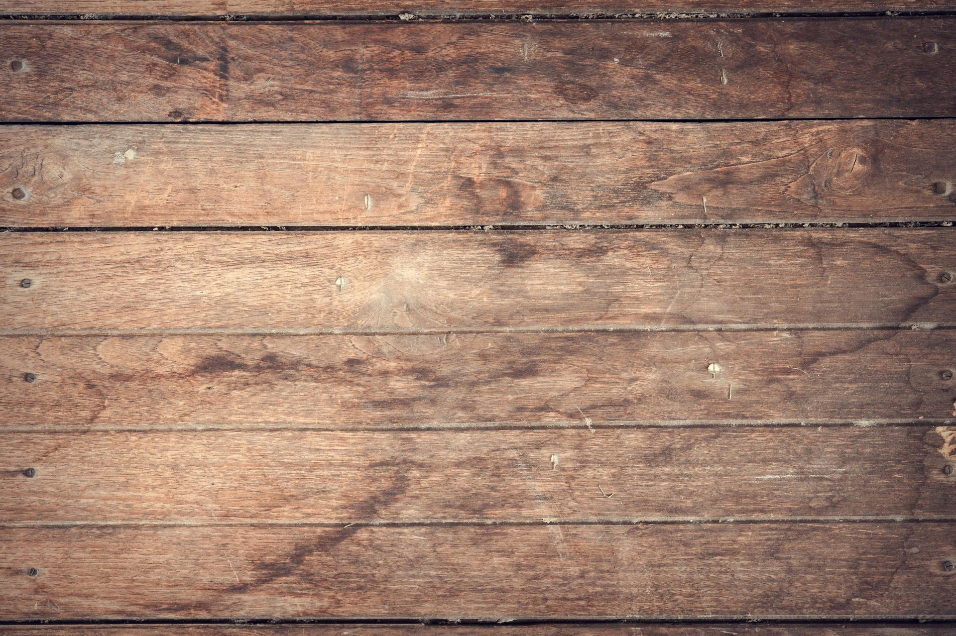 A close up of a wooden floor with a grainy texture. — Capital Ultimate Facility in Queanbeyan, NSW